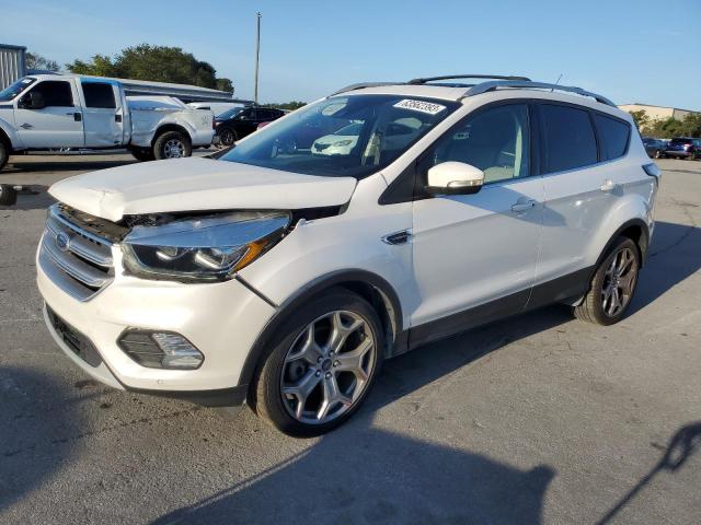 FORD ESCAPE TIT 2017 with VIN 1FMCU0J95HUA09520 - Photo from auction