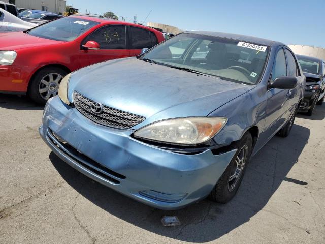 TOYOTA CAMRY LE 2002 with VIN 4T1BF30K22U500999 - Photo from auction