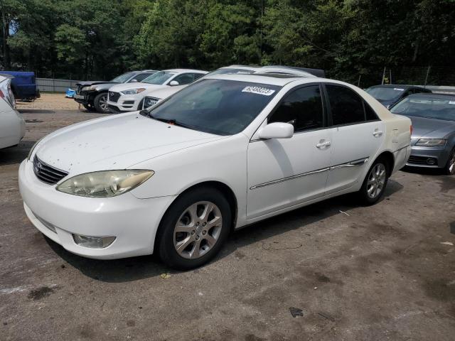 TOYOTA CAMRY LE 2005 with VIN 4T1BF30K75U091208 - Photo from auction