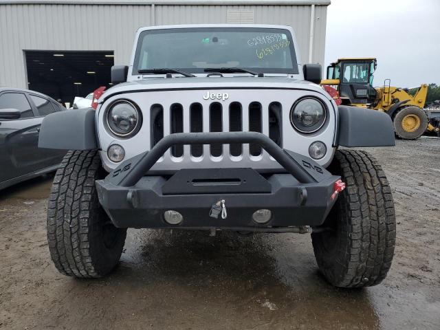 Photo 5 from auction – 2015 JEEP WRANGLER U with VIN 1C4BJWFG8FL693579