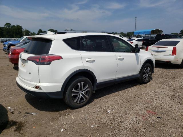 Photo 3 from auction – 2017 TOYOTA RAV4 LE with VIN JTMZFREV0HJ122457