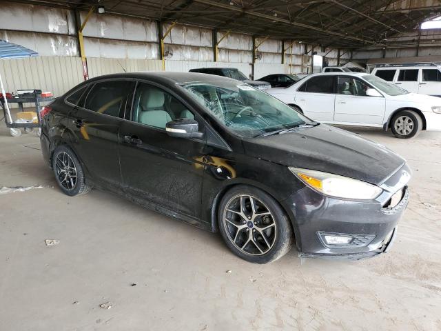 Photo 4 from auction – 2016 FORD FOCUS SE with VIN 1FADP3F20GL203671