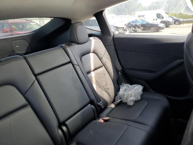 Photo 10 from auction – 2022 TESLA MODEL Y with VIN 7SAYGDEE5NF480560