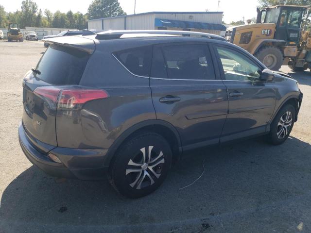 Photo 3 from auction – 2017 TOYOTA RAV4 LE with VIN JTMZFREV3HJ103739