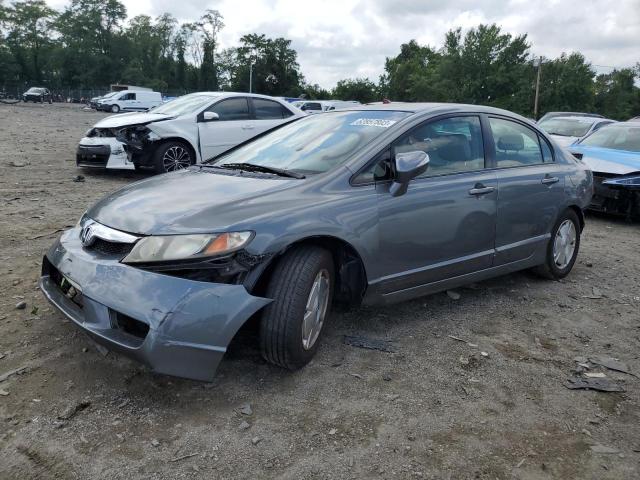 HONDA CIVIC HYBR 2010 with VIN JHMFA3F26AS007489 - Photo from auction