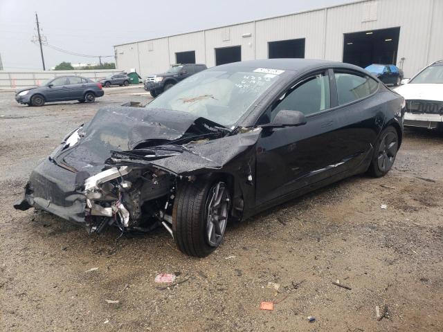 TESLA MODEL 3 2023 with VIN 5YJ3E1EA2PF454641 - Photo from auction