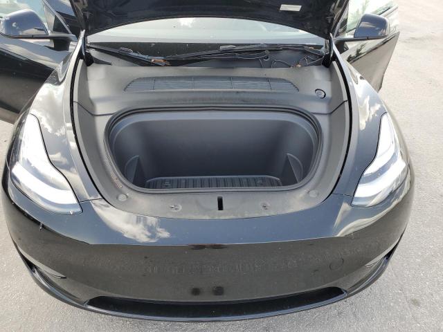 Photo 11 from auction – 2023 TESLA MODEL Y with VIN 7SAYGDEE3PA045343