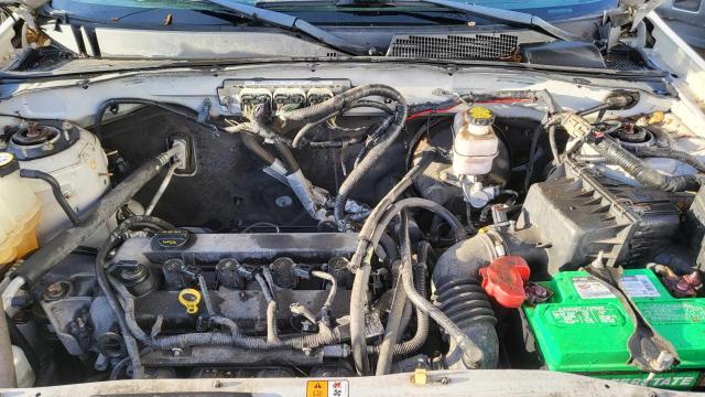 Photo 7 from auction – 2010 FORD ESCAPE LIM with VIN 1FMCU0E75AKD40463