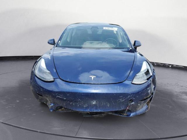 Photo 5 from auction – 2022 TESLA MODEL 3 with VIN 5YJ3E1EA4NF288278