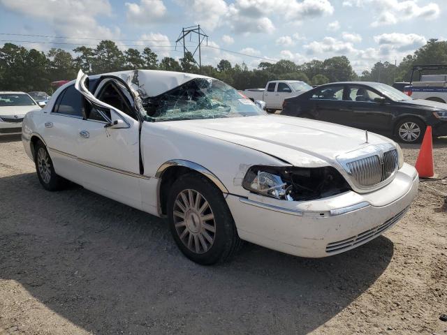 Photo 4 from auction – 2004 LINCOLN TOWN CAR E with VIN 1LNHM81W64Y627796