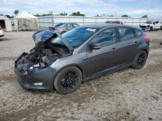 FORD FOCUS 2016 with VIN 1FADP3K21GL306488 - Photo from auction