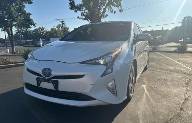 Photo 2 from auction – 2016 TOYOTA PRIUS with VIN JTDKARFU2G3521489