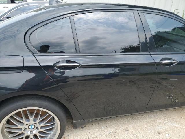 Photo 10 from auction – 2014 BMW 750 I with VIN WBAYA8C56ED228474