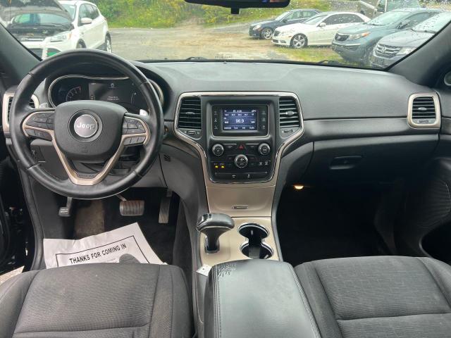 Photo 9 from auction – 2014 JEEP GRAND CHER with VIN 1C4RJFAG2EC205182