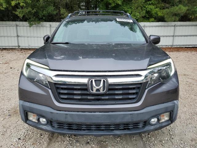 Photo 5 from auction – 2017 HONDA RIDGELINE with VIN 5FPYK2F69HB010406