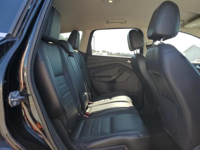 Photo 11 from auction – 2016 FORD ESCAPE SE with VIN 1FMCU9GX1GUC46417