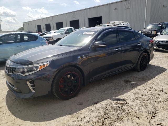 KIA OPTIMA SX 2017 with VIN 5XXGW4L28HG136937 - Photo from auction