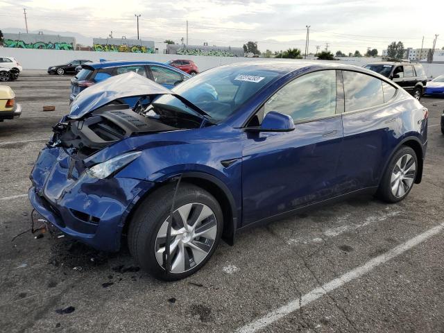 TESLA MODEL Y 2023 with VIN 7SAYGAEE7PF789559 - Photo from auction