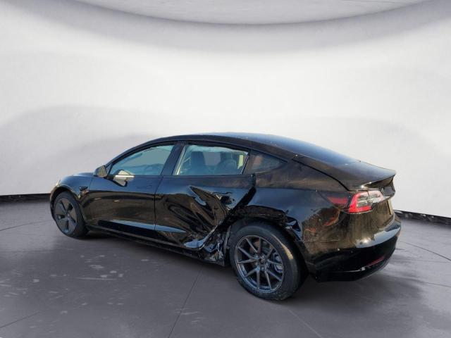 Photo 2 from auction – 2022 TESLA MODEL 3 with VIN 5YJ3E1EA4NF290452
