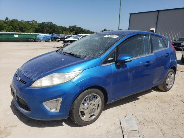 FORD FIESTA SES 2011 with VIN 3FADP4FJ2BM118934 - Photo from auction
