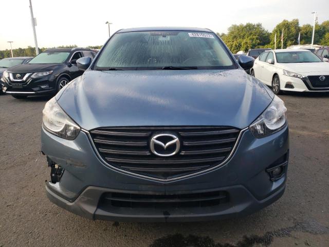Photo 5 from auction – 2016 MAZDA CX-5 TOURI with VIN JM3KE4CY2G0736717