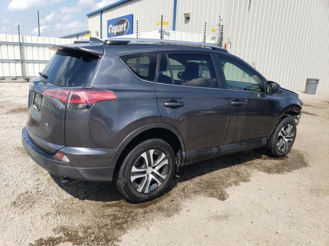 Photo 3 from auction – 2018 TOYOTA RAV4 LE with VIN JTMZFREV9JD130559