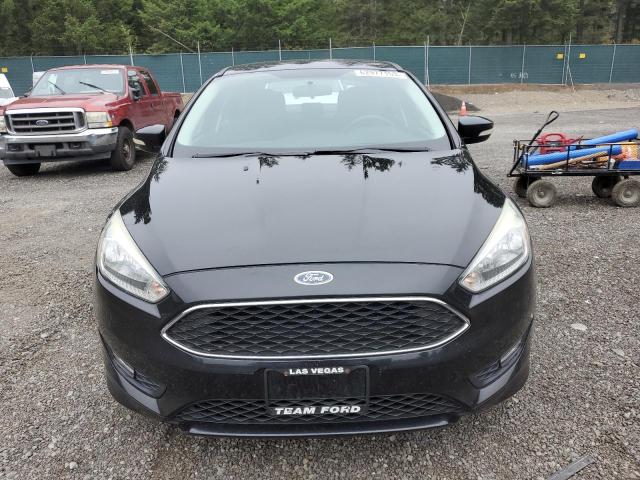 Photo 5 from auction – 2015 FORD FOCUS SE with VIN 1FADP3F20FL261911