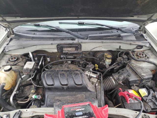 Photo 12 from auction – 2003 FORD ESCAPE LIM with VIN 1FMCU94123KE15141