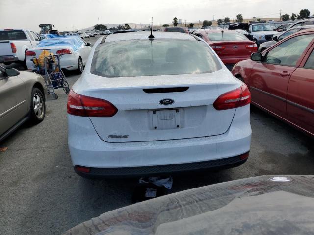 Photo 6 from auction – 2016 FORD FOCUS S with VIN 1FADP3E21GL254629