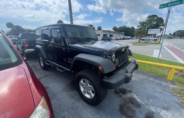 JEEP WRANGLER U 2008 with VIN 1J4GA39168L648049 - Photo from auction