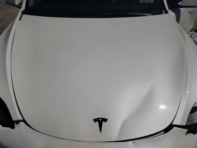 Photo 11 from auction – 2022 TESLA MODEL Y with VIN 7SAYGDEF1NF552265