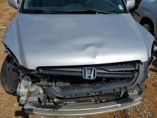 Photo 12 from auction – 2004 HONDA PILOT EXL with VIN 2HKYF18574H555320