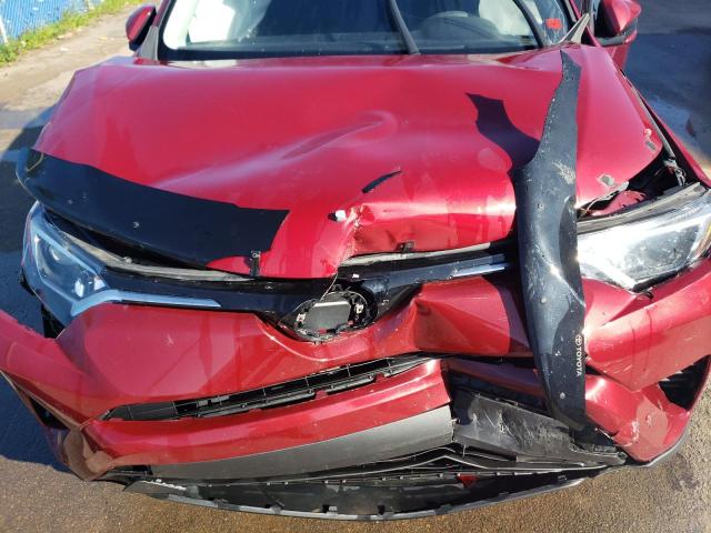 Photo 12 from auction – 2018 TOYOTA RAV4 LE with VIN 2T3BFREV9JW779475