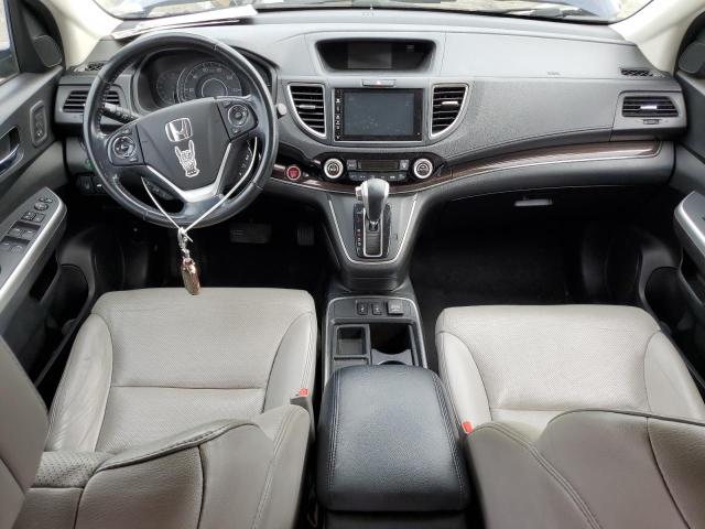 Photo 8 from auction – 2015 HONDA CR-V TOURI with VIN 5J6RM4H95FL099809