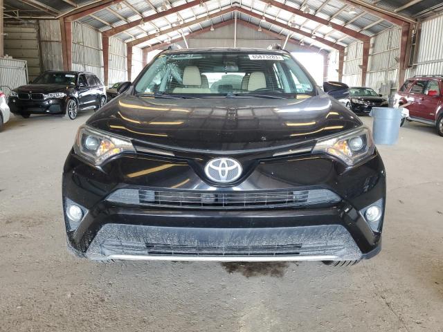 Photo 5 from auction – 2016 TOYOTA RAV4 XLE with VIN 2T3WFREV0GW310429