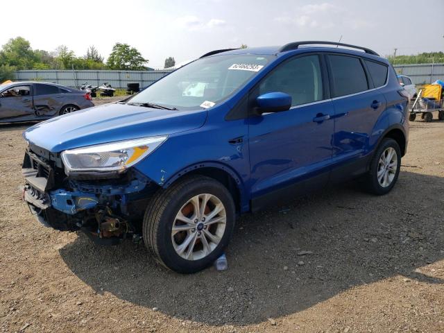 FORD ESCAPE SE 2018 with VIN 1FMCU9GD1JUD42903 - Photo from auction
