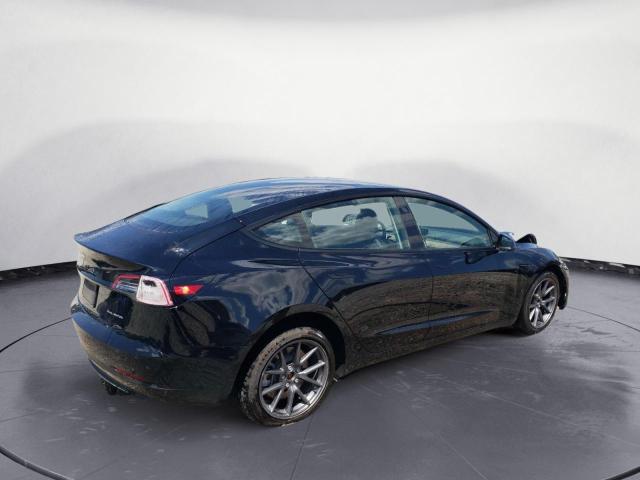 Photo 3 from auction – 2022 TESLA MODEL 3 with VIN 5YJ3E1EB5NF291196