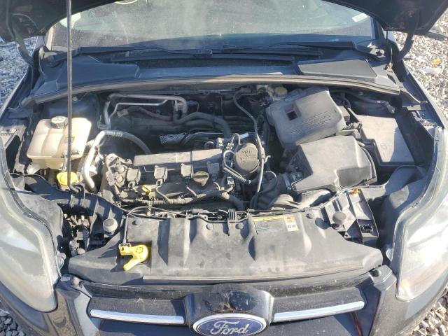 Photo 11 from auction – 2012 FORD FOCUS TITA with VIN 1FAHP3N21CL329633