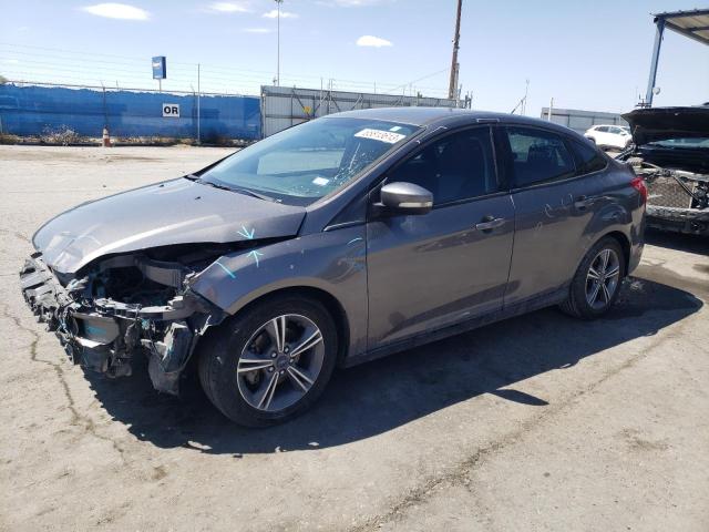 FORD FOCUS SE 2014 with VIN 1FADP3F29EL460406 - Photo from auction