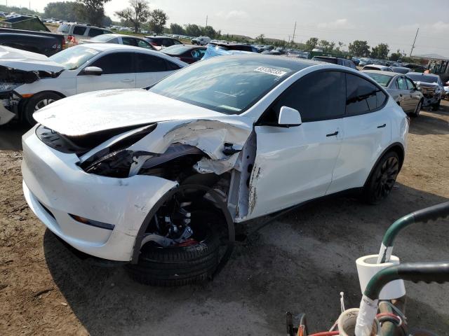 TESLA MODEL Y 2022 with VIN 7SAYGDEF4NF440771 - Photo from auction