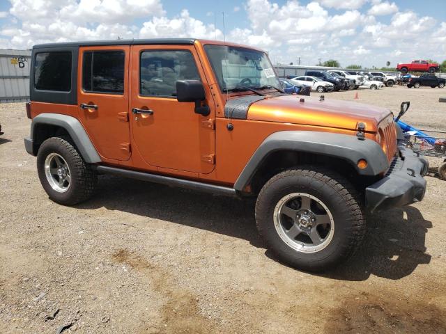 Photo 4 from auction – 2011 JEEP WRANGLER U with VIN 1J4BA3H1XBL520352