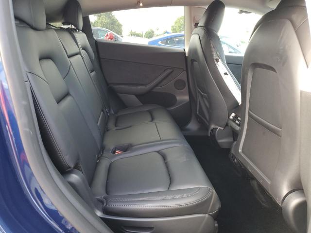 Photo 11 from auction – 2023 TESLA MODEL Y with VIN 7SAYGAEE7PF789559