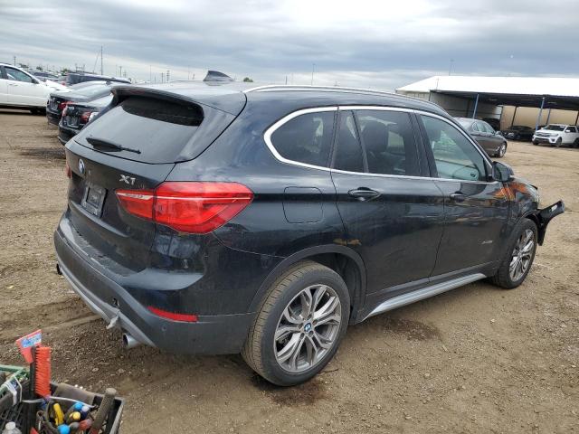 Photo 3 from auction – 2017 BMW X1 XDRIVE2 with VIN WBXHT3Z30H4A52067