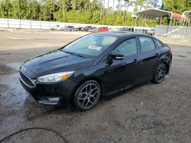 FORD FOCUS SE 2016 with VIN 1FADP3F2XGL401948 - Photo from auction