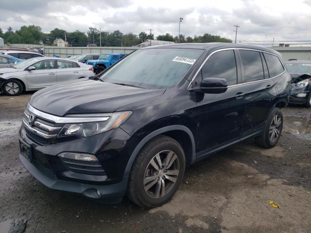 HONDA PILOT EXL 2018 with VIN 5FNYF6H59JB068868 - Photo from auction