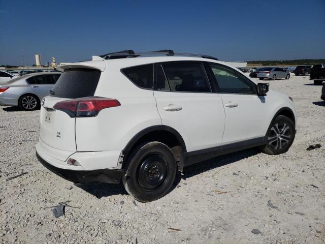 Photo 3 from auction – 2017 TOYOTA RAV4 LE with VIN JTMBFREV5HJ128658
