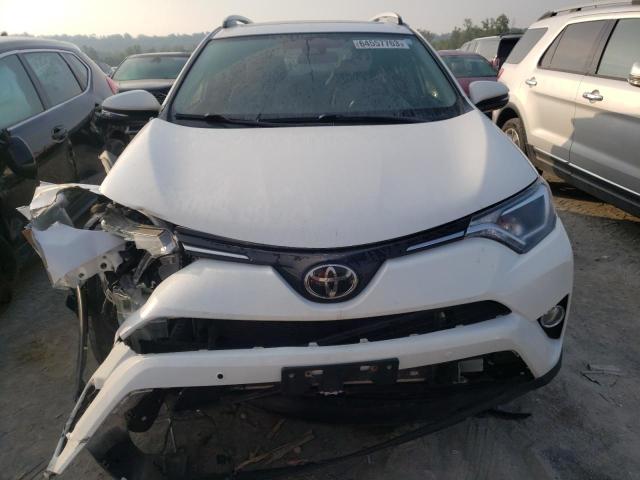 Photo 5 from auction – 2017 TOYOTA RAV4 XLE with VIN JTMRFREV5HD217210
