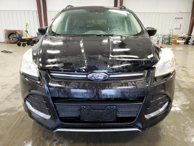 Photo 5 from auction – 2016 FORD ESCAPE SE with VIN 1FMCU9GX3GUB02058