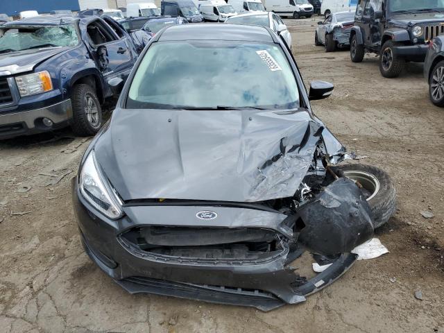 Снимка 5 от търг – 2017 FORD FOCUS SE с VIN 1FADP3F24HL289908