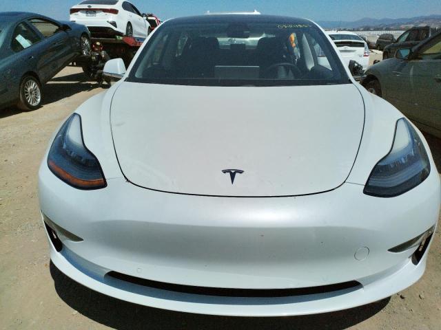 Photo 5 from auction – 2018 TESLA MODEL 3 with VIN 5YJ3E1EA0JF019737